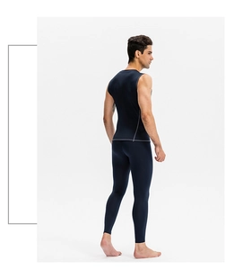 Detailed side view of navy blue men's compression vest and pants with premium flat seams