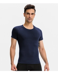 Detailed close-up of dark blue slim fit compression gym shirt showing fabric texture