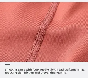 Cucitura piatta di precisione su pantaloncini da yoga marrone rosso elasticizzati
