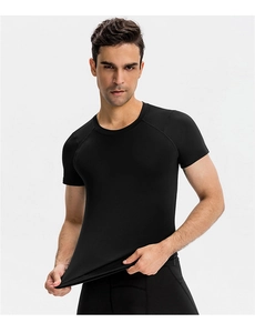 Men's athletic compression tee with ergonomic raglan sleeves for fitness training