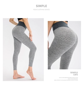 Detail of high waist grey honeycomb yoga leggings with ruched butt lifting design