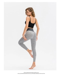 Close-up of high-waisted honeycomb texture leggings showing bum lifting effect