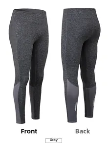 Détail du legging de yoga gris à taille haute avec bandes réfléchissantes de sport