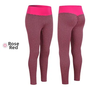 Detailed view of rose red honeycomb yoga leggings with scrunch butt lifting texture
