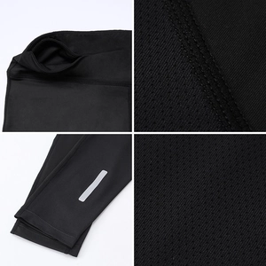 Détail de la poche de taille cachée, coutures à quatre aiguilles et bandes réfléchissantes