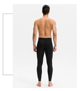 Rear view of men's black compression leggings showing high elasticity and athletic fit