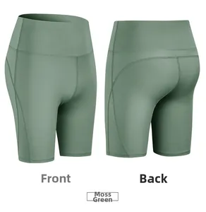 Front and back views of high-waist moss green yoga shorts with peach hip lifting seam