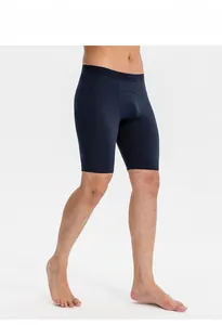 Detail view of men's navy blue athletic shorts with functional side pocket for running