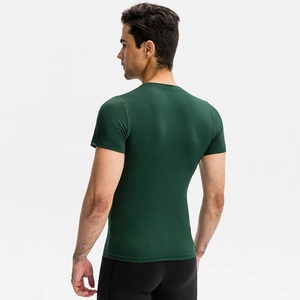 Men's dark green PRO compression gym t-shirt showing rear muscle fit and athletic design