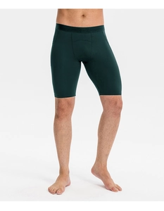 Detail of dark green men's compression shorts with high-stretch fabric and ergonomic fit