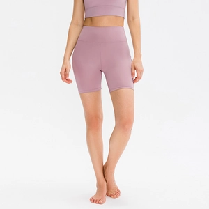 Women's high waist yoga shorts set in dusty pink with matte elastic athletic fabric