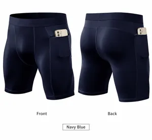 Vista de detalle del pantalón corto de compresión azul marino con bolsillo de cremallera
