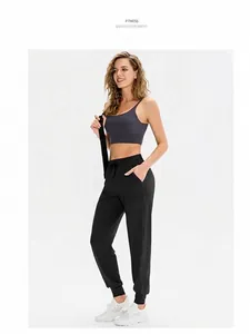 Pantaloni sportivi neri a vita alta da donna con tasche laterali e taglio fitness