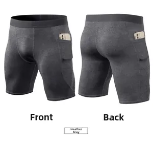 Detail view of heather gray athletic compression shorts featuring side phone storage pockets