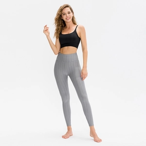 Women's high waist honeycomb yoga leggings and black sports bra fitness set for gym workout