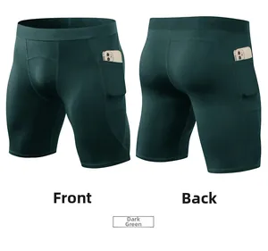 Men's compression sports shorts in dark green with hidden side pockets for phone storage
