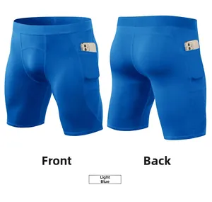 Close-up of light blue men's athletic shorts featuring built-in side pockets for phone storage