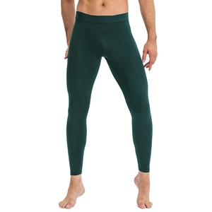 Men's dark green compression pants for gym training with elastic waist and U-shaped seams