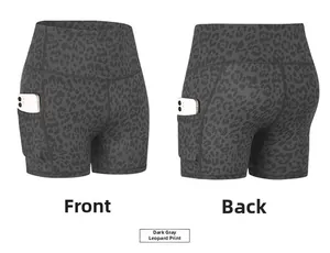 Detail of high waist leopard yoga shorts featuring a functional side phone pocket