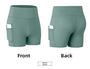 Detail of high waisted yoga shorts in dark green with side pocket for mobile phone