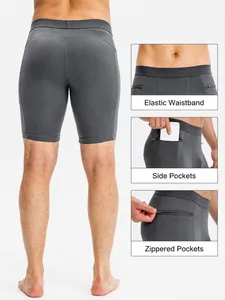 Pantalones cortos de fitness grises para hombre con cintura elástica y bolsillos con cremallera