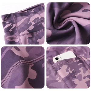 Close-up of purple camo yoga shorts showing high waist, seamless stitching and side pocket