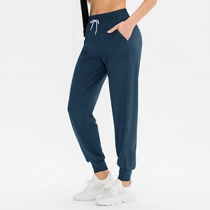 Pantaloni da yoga larghi da donna a vita alta con coulisse in blu petrolio