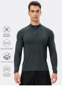 Detailed view of grey gym shirt features breathable fabric and half-zip collar design