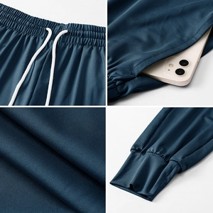 Détails du jogging bleu marine avec cordon de serrage, poches latérales et ourlets