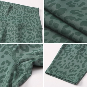 Detail of high-waist leopard print yoga pants with reinforced stitching and flat seams