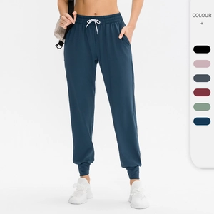 Pantalon de Jogging à Taille Haute pour Femmes Avec Poches Cordon de Serrage Pantalon de Sport pour Yoga Fitness Casual Ample