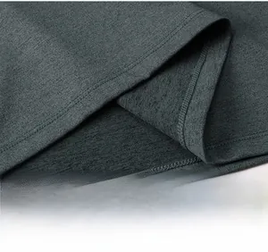 Detail view of double-stitched hem on a men's charcoal grey slim fit sports sweatshirt