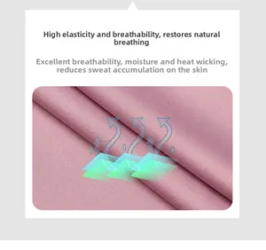 Détail macro du tissu en maille rose respirant montrant la technologie d'évacuation d'humidité