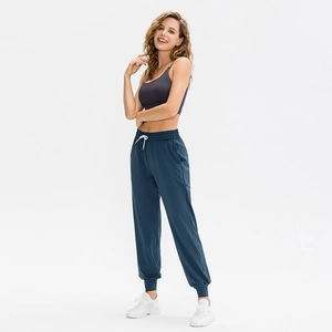 Pantalon de jogging de sport pour femmes avec cordon de serrage et poches pour le yoga