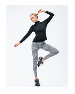 Close-up of women's zip-up sports jacket with slim fit and stand collar design