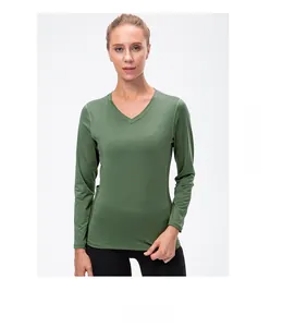 Detail showing the olive green slim fit sports shirt with a V-neck and reinforced seams