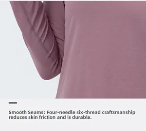 Detail view of four-needle six-thread stitching on pink long-sleeve yoga shirt sleeves