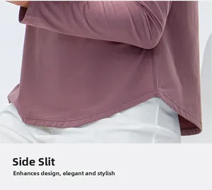 Detailed macro shot of the curved side slit and high-density fabric on yoga long sleeve top