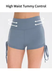 Detail of high waisted yoga shorts with adjustable side drawstrings and tummy control