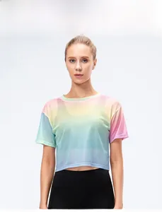 Detail of loose rainbow gradient mesh crop top with breathable quick-dry fabric texture