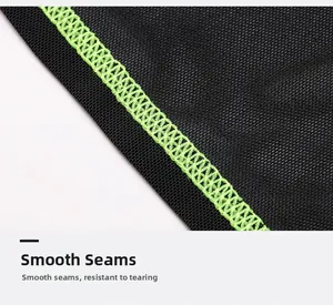 Close-up of flat seam construction with vibrant neon green stitching on black mesh fabric