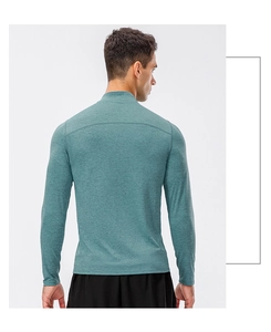 Men's half-zip running shirt back view showing reinforced shoulder seams and dry-fit fabric