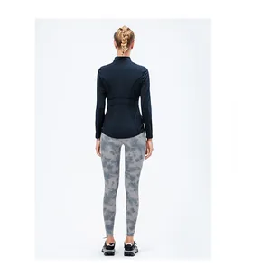 Back view of women's slim-fit long sleeve sports jacket and tie-dye leggings set