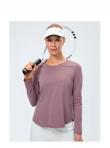 Close-up of mauve quick-dry yoga top featuring breathable knit fabric and curved hem