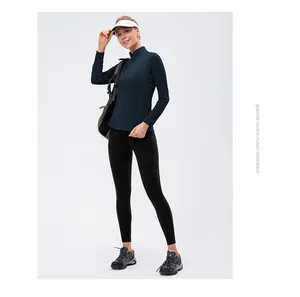 Detail shot of navy blue long sleeve zipper jacket for yoga and running sports
