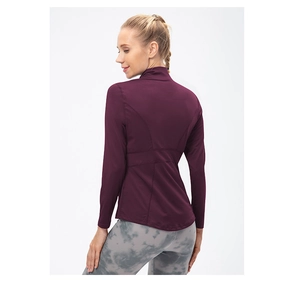 Slim fit burgundy zip jacket with back seam detail and marble leggings on model
