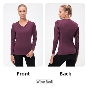 Detail view of wine red slim fit long sleeve yoga shirt with moisture-wicking fabric