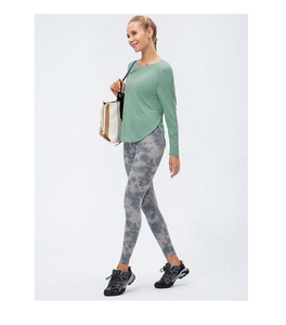 Maglia da yoga larga da donna a maniche lunghe con orlo curvo per allenamento e fitness