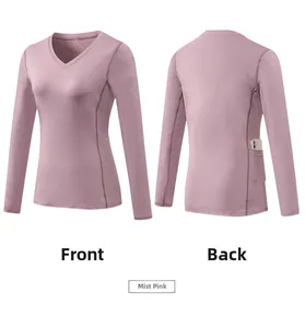 Detail view of dusty pink long sleeve yoga top with hidden back pocket for smartphone