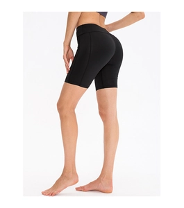 Side view of black high-waisted yoga shorts with ergonomic seams and lifting effect